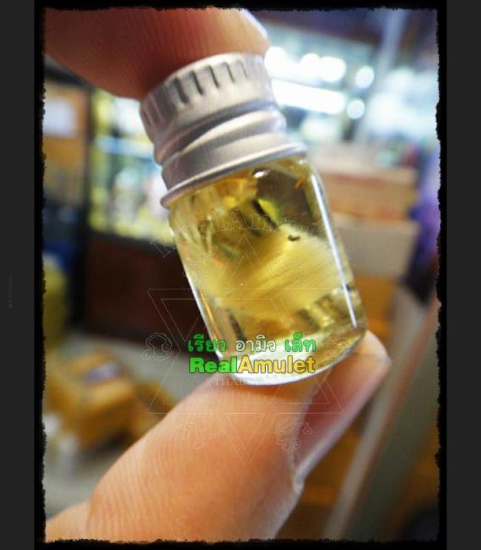 NAMANPLAI OIL CHARMING LOVE ATTRACT GAMBLING RICH LUCK THAI AMULET LP KERN BE2555